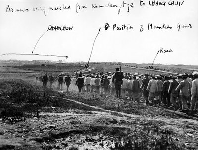 Chinese Prisoners being marched from Kuanchengtze, c.1931 by Japanese Photographer